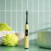 Электрическая зубная щетка Beurer SC 50 Splashy Lemon GP - Фото№4