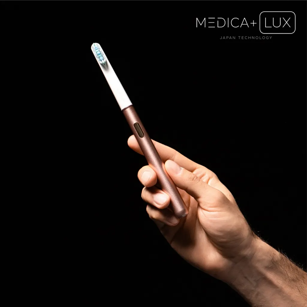 Відбілювальна звукова зубна щітка Medica+Lux 10Х Portable, рожевий Відбілювальна звукова зубна щітка Medica+Lux 10Х Portable, рожевий